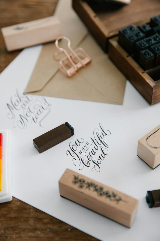 items on a desk for making greeting cards - photo by Katya Wolf, pexels.com